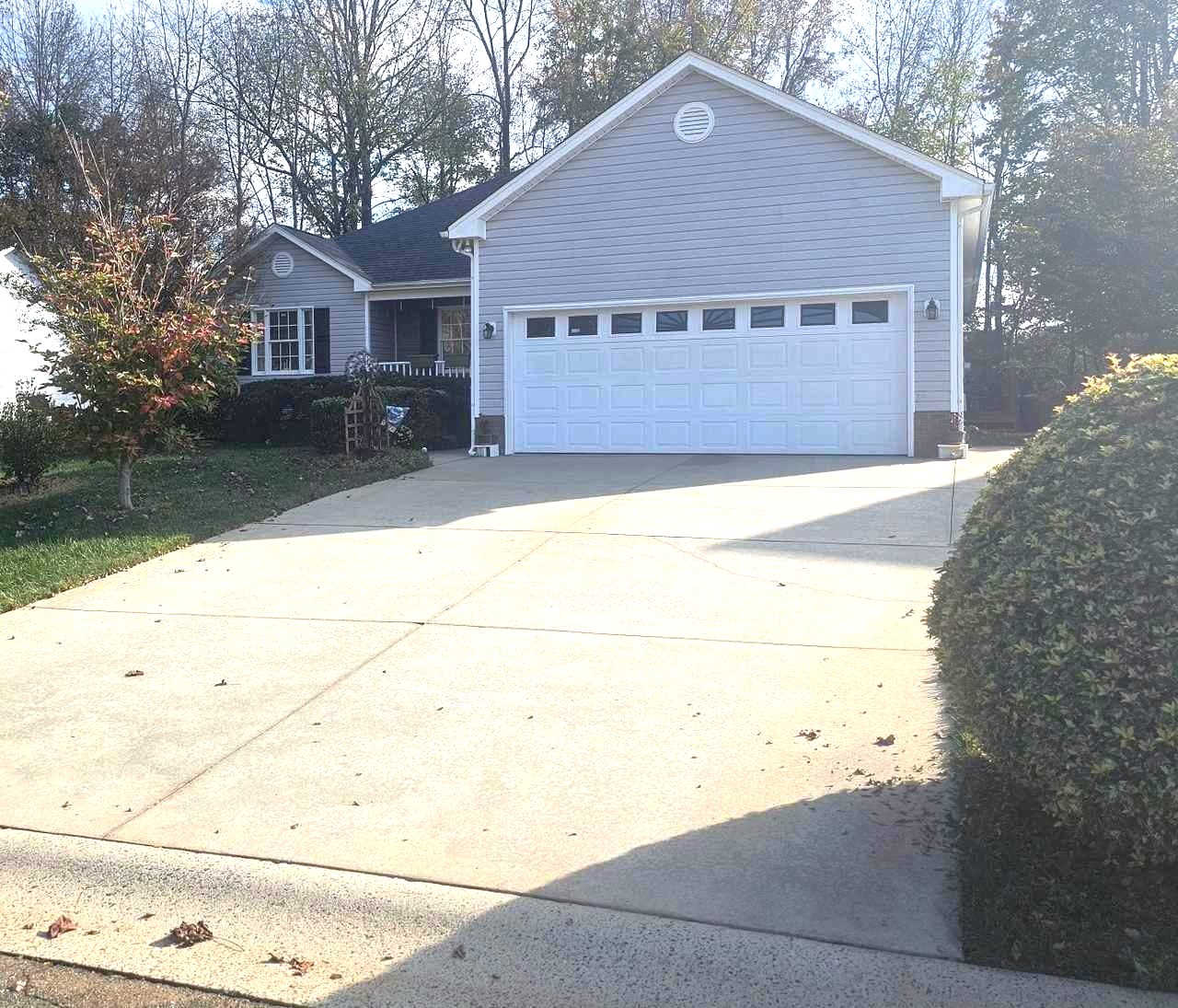 Detailed house wash with driveway cleaning in Mebane, North Carolina and homeowner was very pleased!